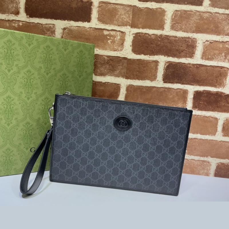 G*u*i clutch bags